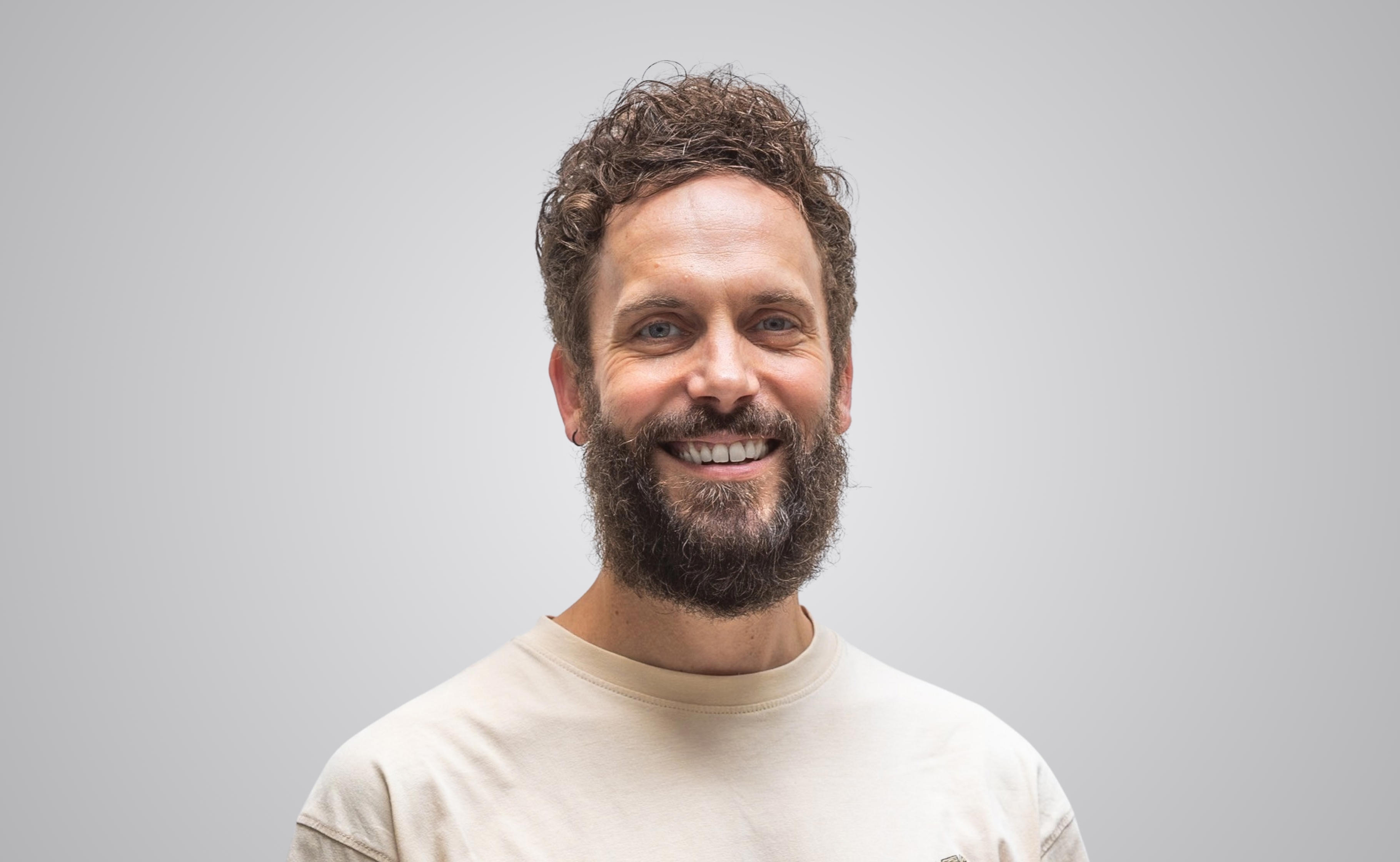 Dave Lockerman is smiling.