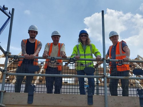 Eastlight's Debbie Mitchell with contractors on site at Longacrre