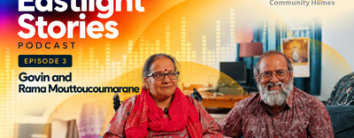 Graphic promoting the Eastlight Stories Podcast. Text reads "Episode 3: Govin and Rama Mouttoucoumarane". The Eastlight logo appears in the top right, alongside a photo of two people sat next to each other. One of them is in a wheelchair.