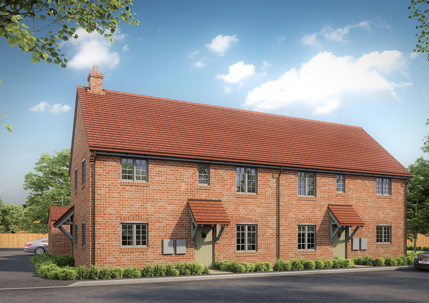A row of newly built Eastlight homes at an Eastlight housing development in Halstead, featuring red-brick exteriors, pitched roofs and landscaped planting along the frontage.