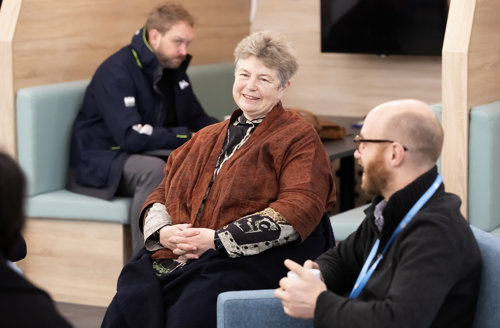 Hattie speaking to people at Eastlight House