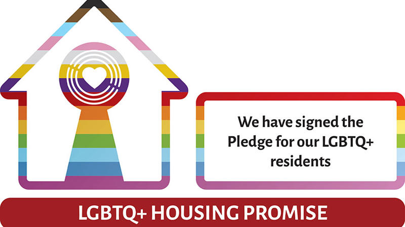 Logo of LGBTQ+ Housing Pioneer+ featuring a house with rainbow colours and text  stating, "We are going further alongside our LGBTQ+ residents.