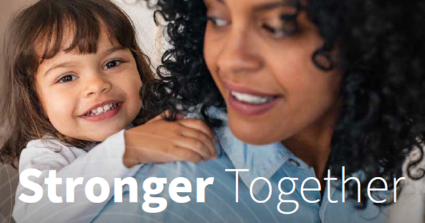 Mother and child with "Stronger Together" on the picture