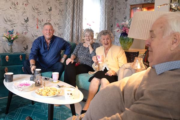 Residents laughing in a scheme