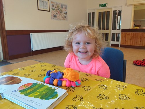 A child enjoys fun activities through Homestart Essex while parents and carers receive support and connect with others.