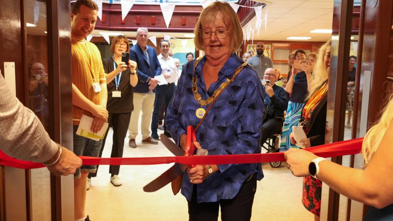 Ruth cutting the ribbon at Foundry Court